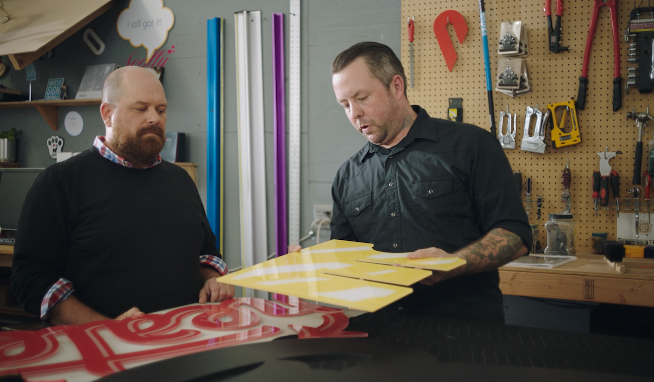 Photo of Martin and Bobby at Martin Sign Company