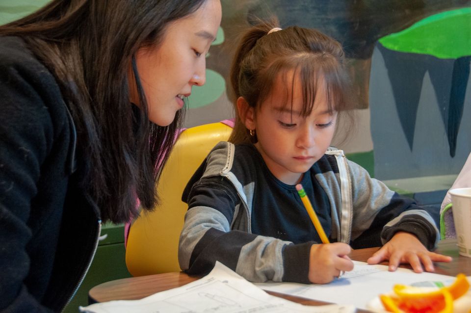 Photo of teacher and student at 826 Valencia by Quynh-Le Nguyen