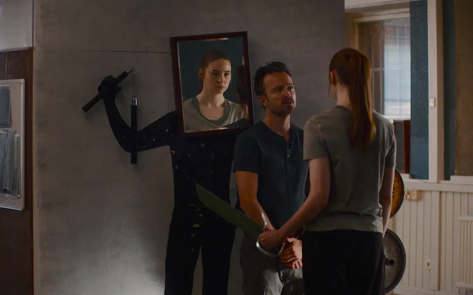 Aaron Paul and Karen Gillan appear in DUAL by Riley Stearns, an official selection of the U.S. Dramatic Competition at the 2022 Sundance Film Festival. Courtesy of Sundance Institute.