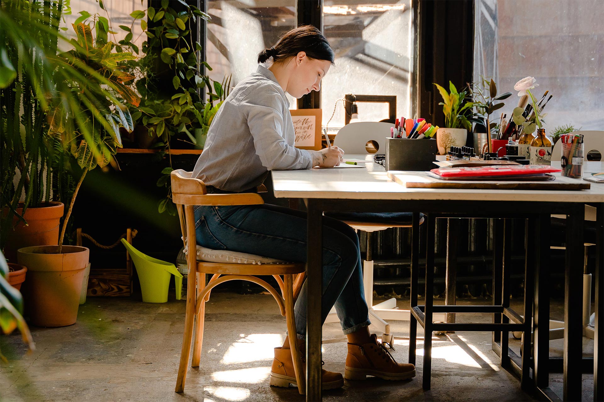 A person focused on writing