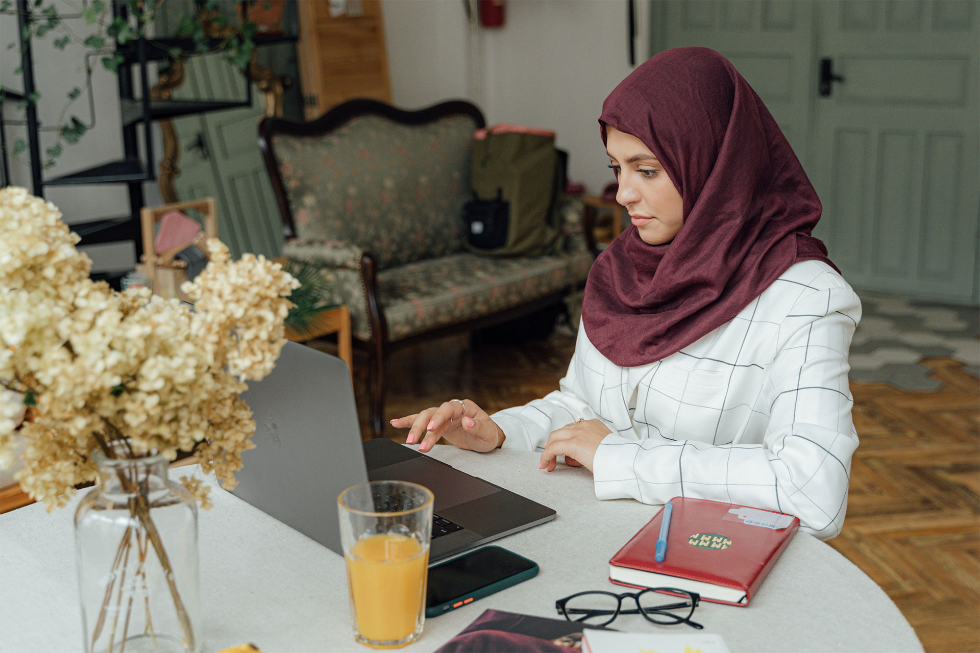 A person working from home on their laptop