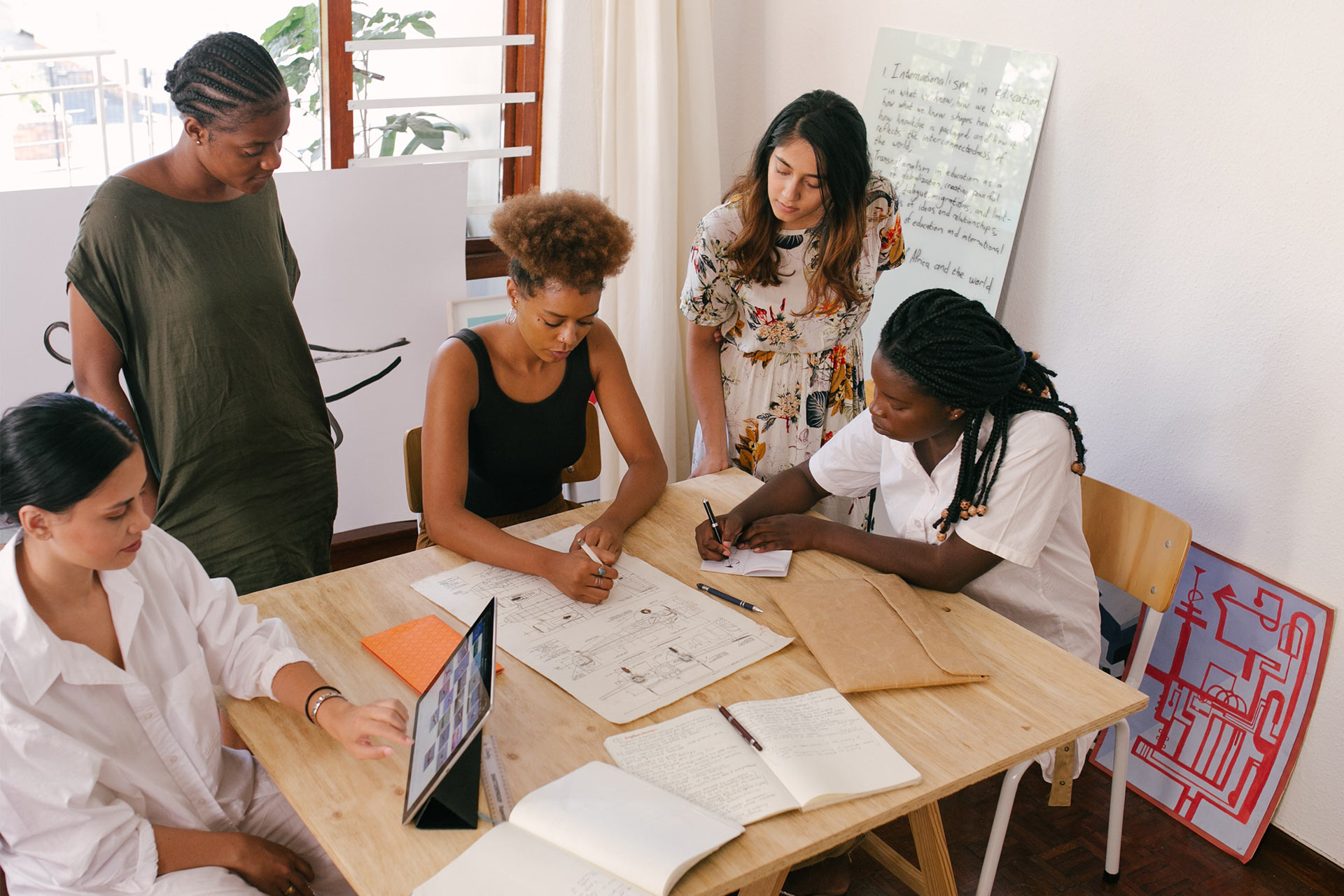 A team meeting where a problem is being solved with the PDCA management method