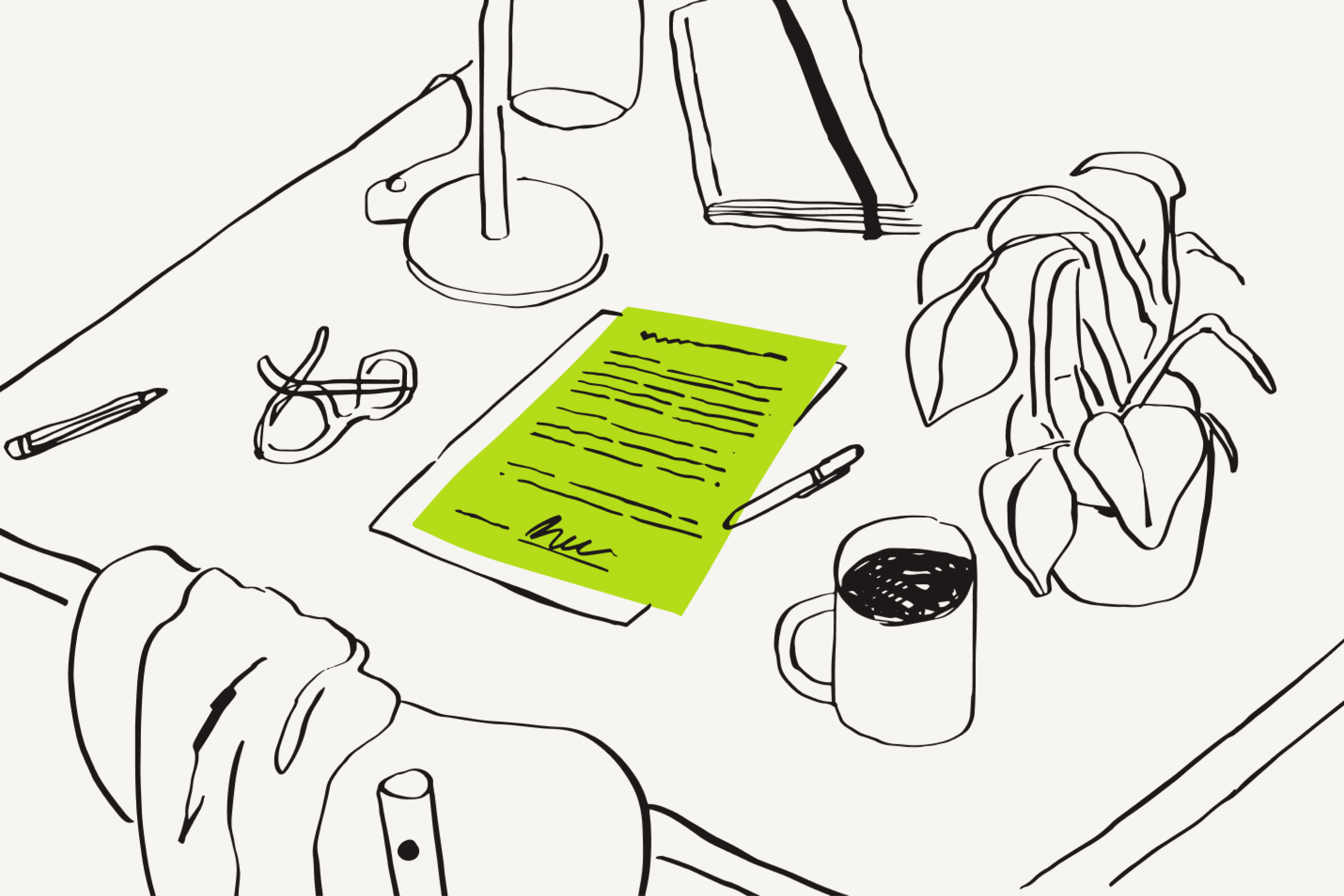 Um documento assinado em cima da mesa de uma pessoa que trabalha em casa