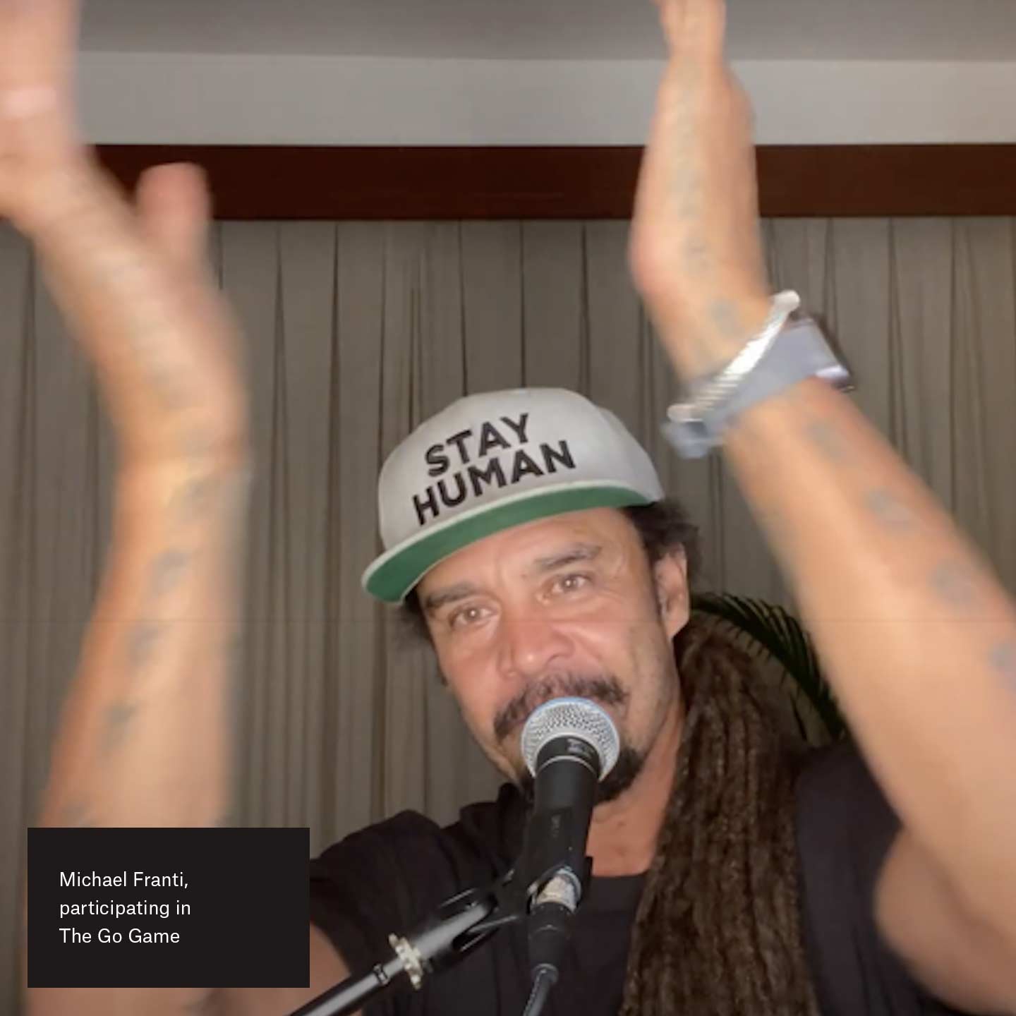 Michael Franti, participating in The Go Game