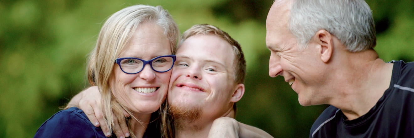 A family smiles together.