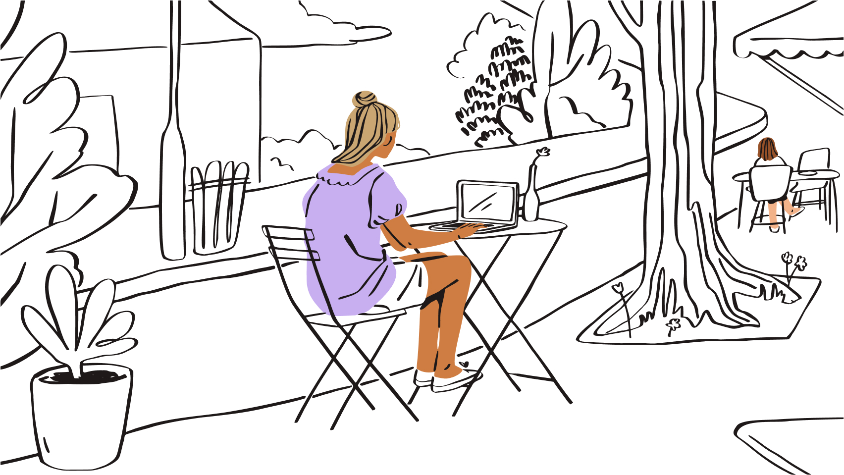 Woman at cafe on a computer