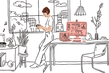 Person standing by a window, near a desk with pink-highlighted digital documents