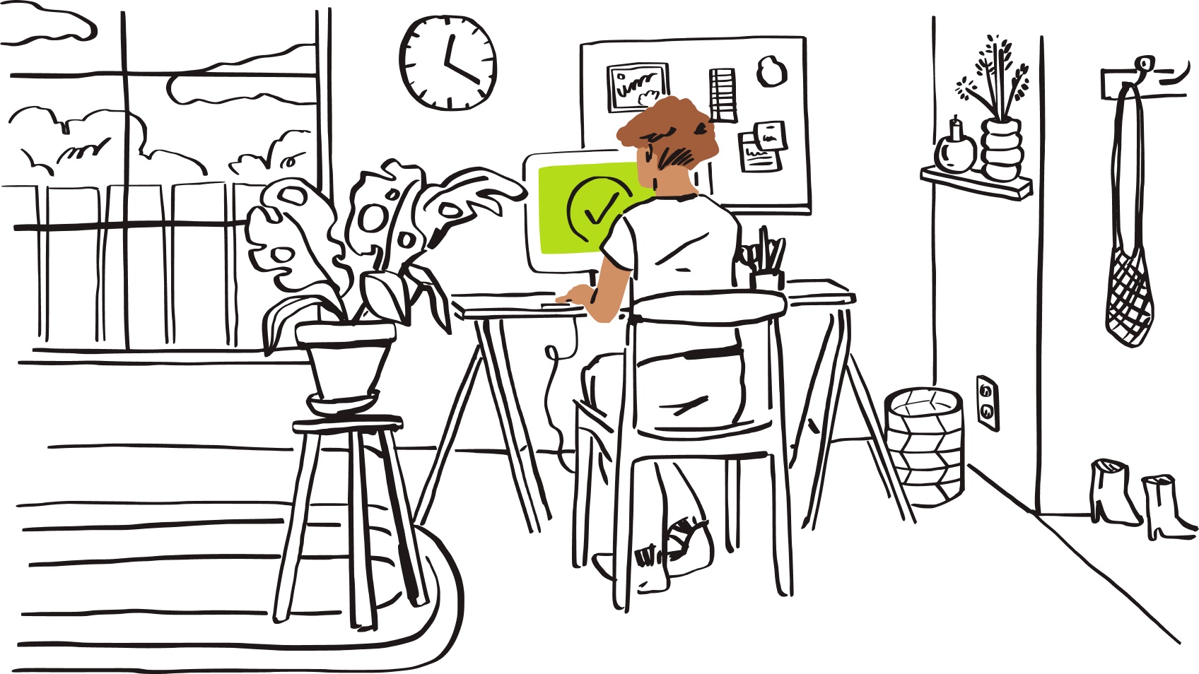 Una persona teletrabajando desde casa en un escritorio con una pantalla verde en la que se muestra una marca de verificación.