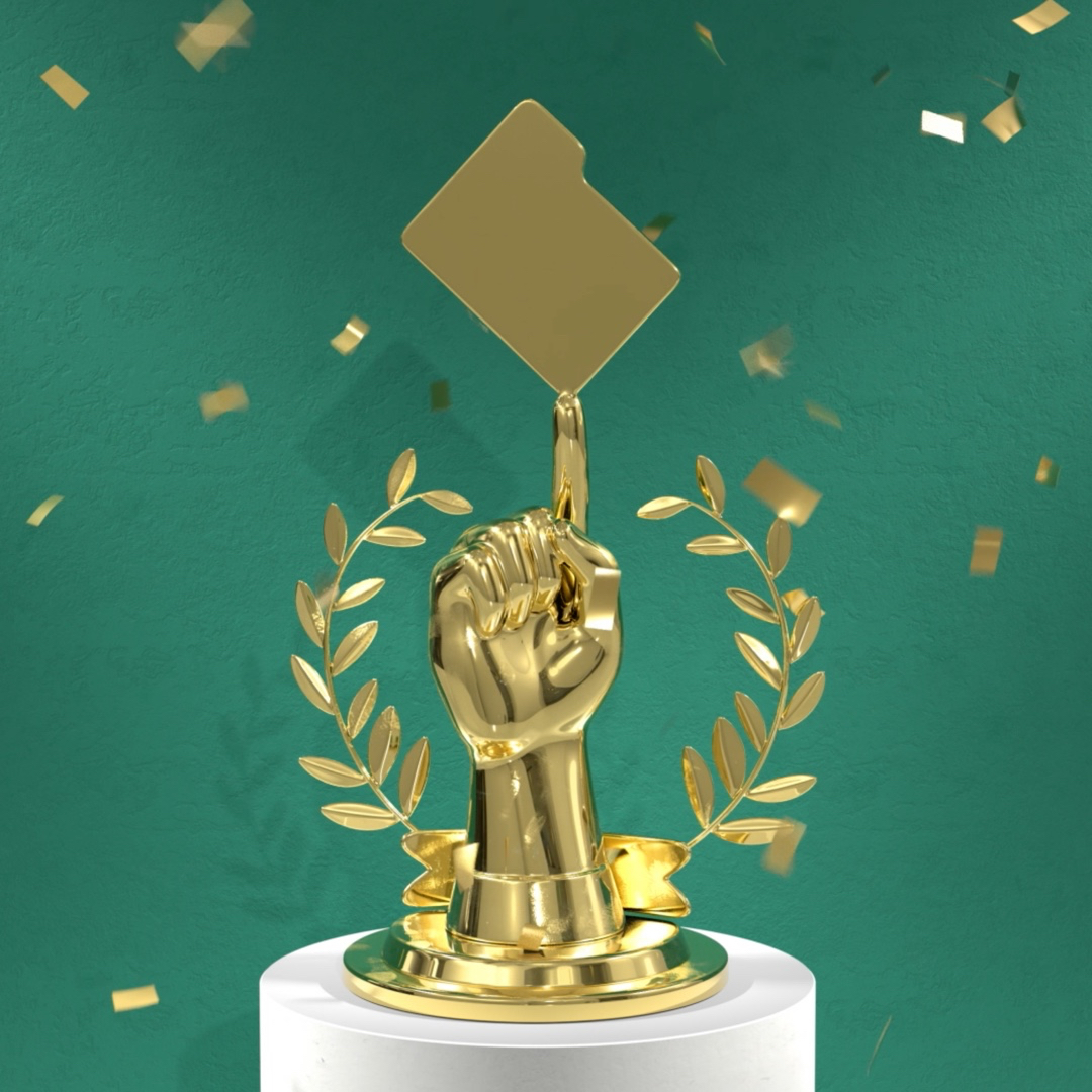 Golden trophy in the shape of a hand pointing to a file